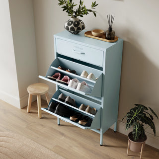 The Shoreditch shoe cabinet in sky blue with a top drawer, two lower shoe compartments and matching handles, styled in a hallway.