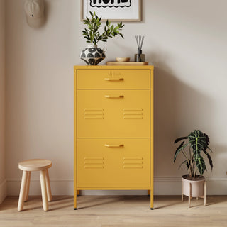 The Shoreditch shoe cabinet in mustard with a top drawer, two lower shoe compartments and matching handles, styled in a hallway.