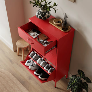 The Shoreditch shoe cabinet in red with a top drawer, two lower shoe compartments and matching handles, styled in a hallway.