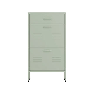 The Shoreditch shoe cabinet in sage with a top drawer, two lower shoe compartments and matching handles, styled in a hallway.